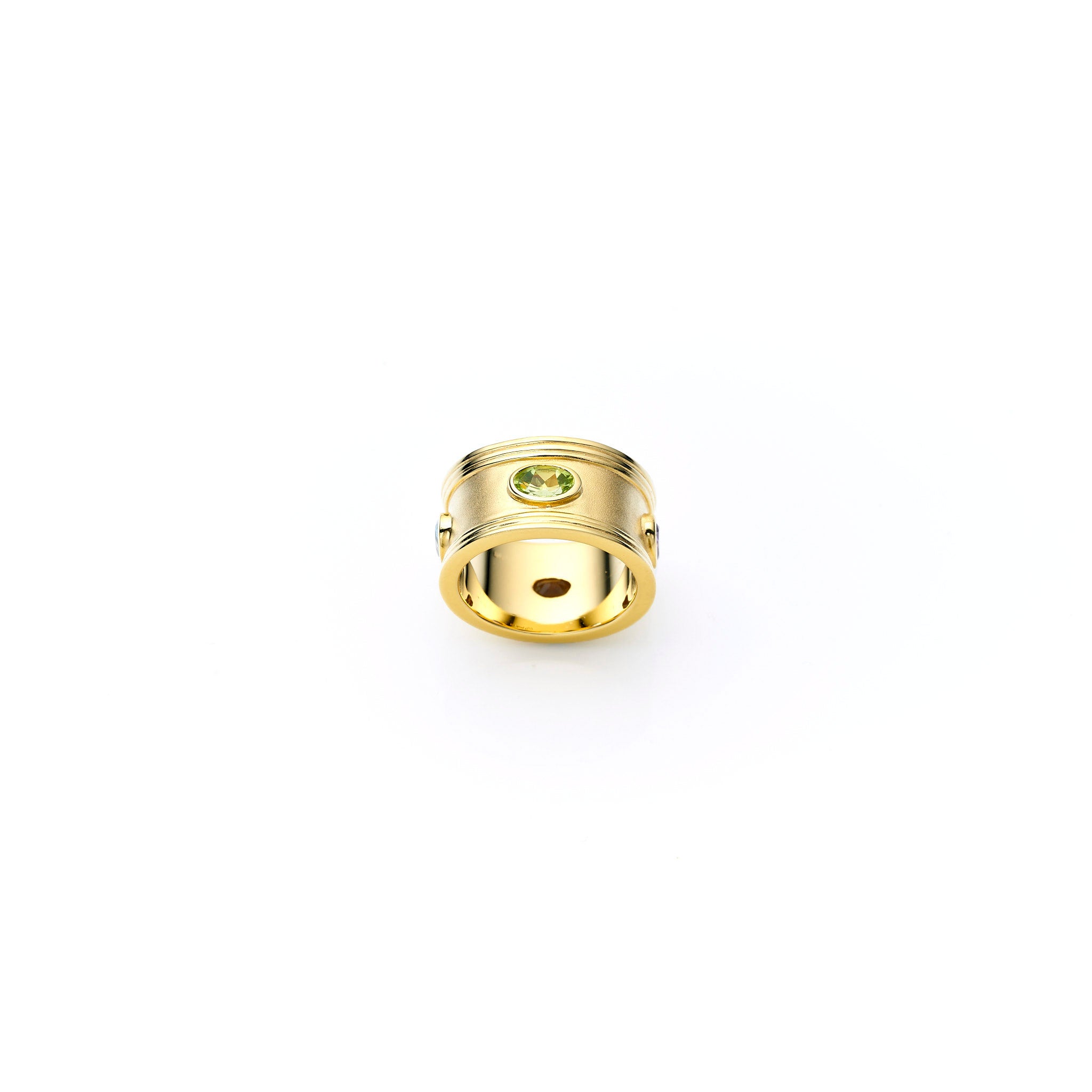 Gold and precious stones ring, jewellery designer, peridot, ruby, citrine, topaz